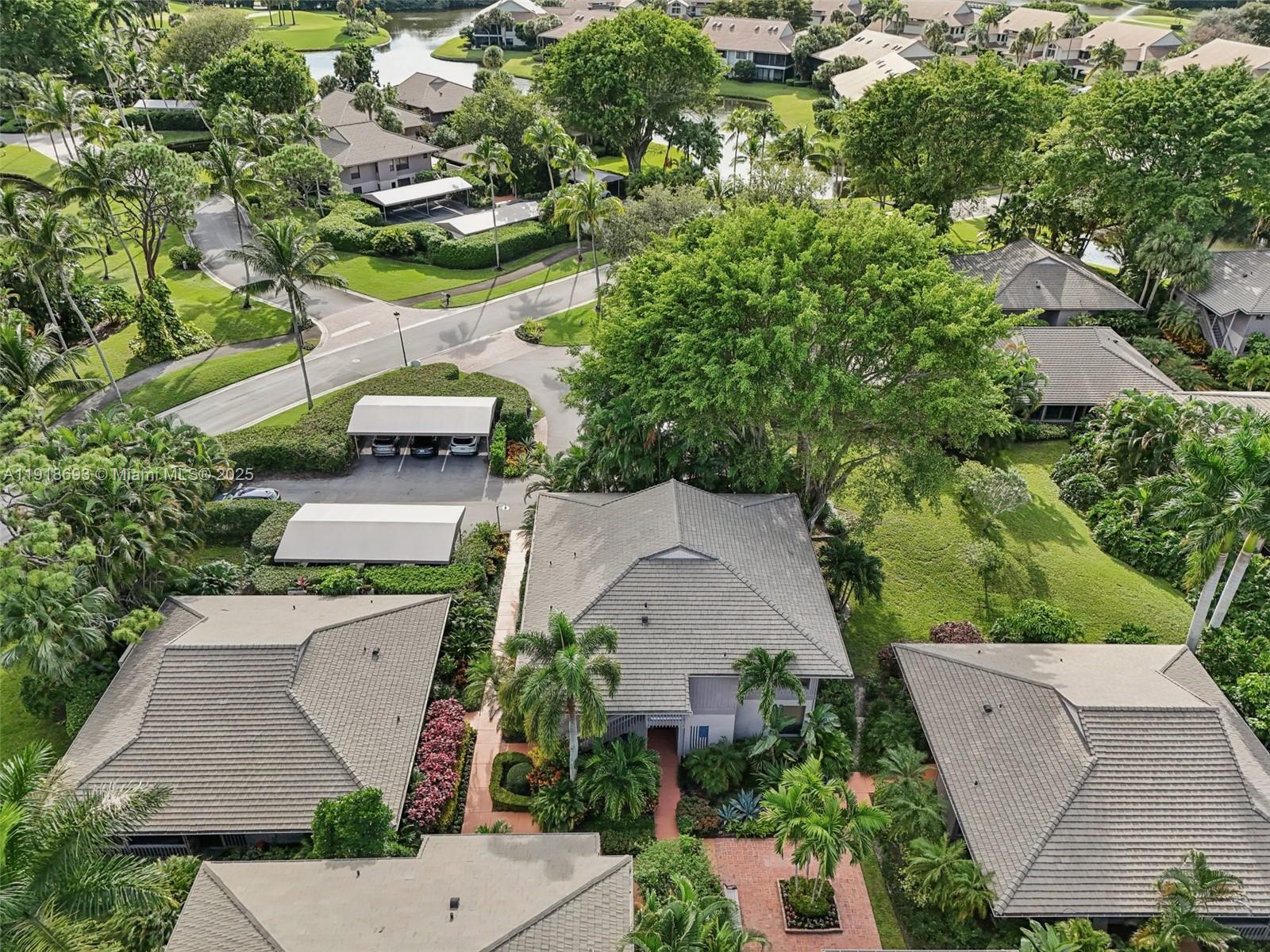 7123 Rain Forest Drive, Unit A Boca Raton, FL 33434 - Photo 68 of 75 an aerial view of a house with garden space and street view