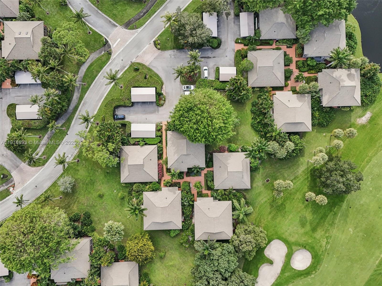 7123 Rain Forest Drive, Unit A Boca Raton, FL 33434 - Photo 71 of 75 an aerial view of a house with yard swimming pool and outdoor seating