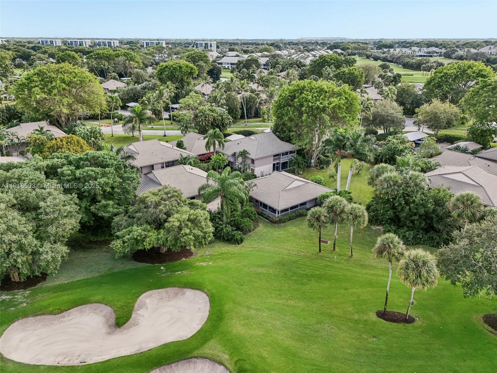 7123 Rain Forest Drive, Unit A Boca Raton, FL 33434 - Photo 75 of 75 an aerial view of a house with outdoor space and street view