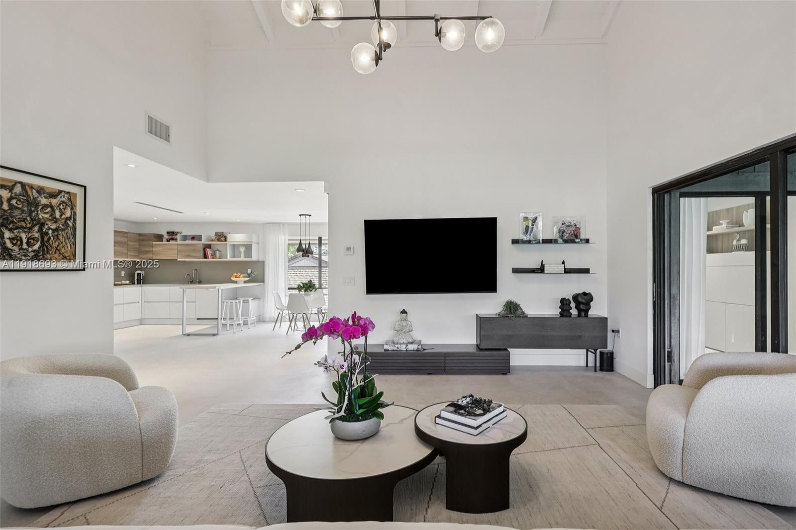 7123 Rain Forest Drive, Unit A Boca Raton, FL 33434 - Photo 9 of 75 a living room with furniture potted plant and a window