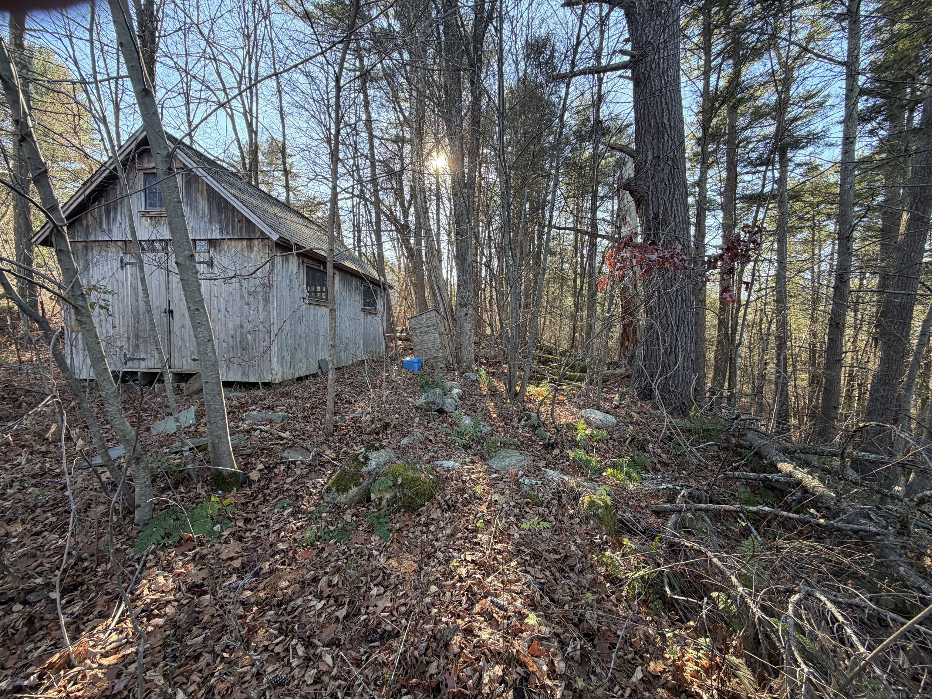 70 Kent Road South Cornwall, CT 06754 - Photo 10 of 13 a view of a wooden house with large trees
