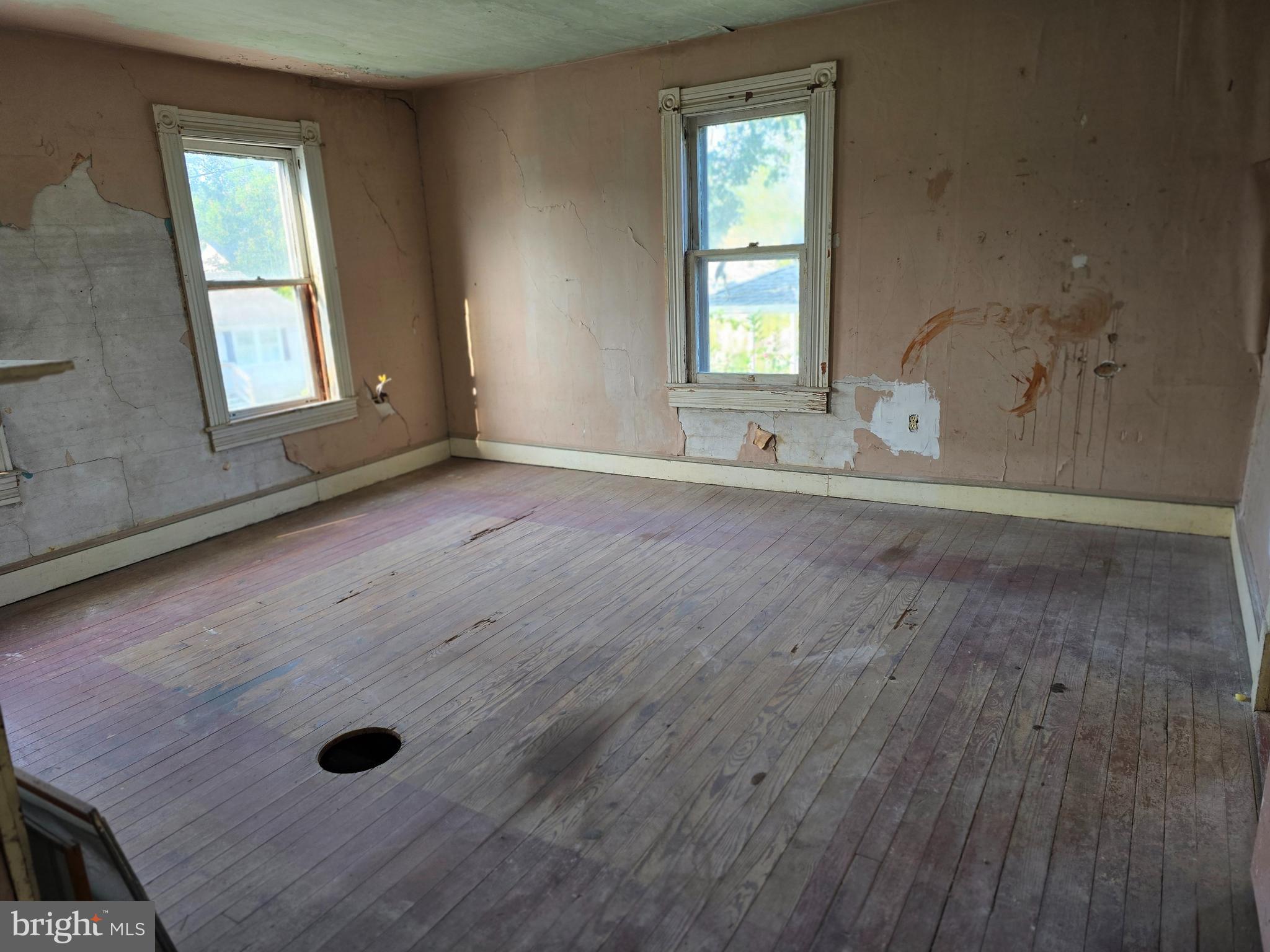 40 Maple Street Crisfield, MD 21817 - Photo 11 of 14 an empty room with windows