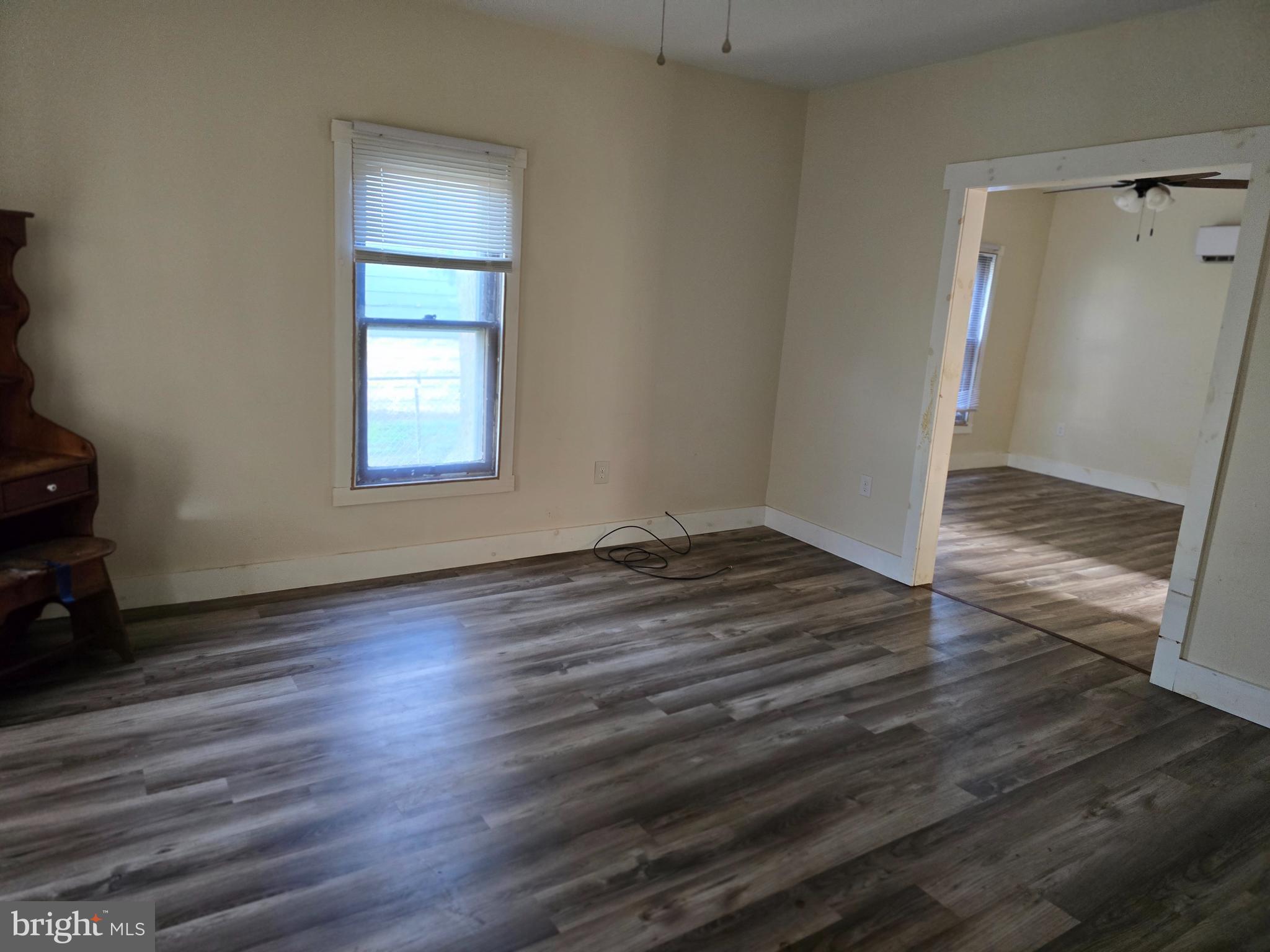40 Maple Street Crisfield, MD 21817 - Photo 14 of 14 an empty room with wooden floor and closet
