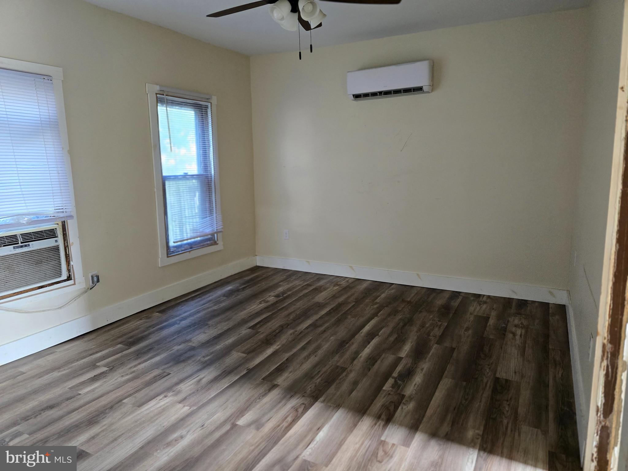 40 Maple Street Crisfield, MD 21817 - Photo 8 of 14 a view of wooden floor and a sink in a room