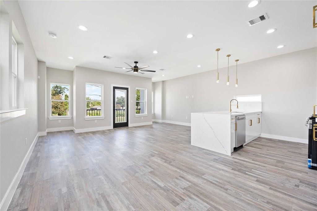 2118 Dan Street Houston, TX 77020 - Photo 24 of 35 a view of a kitchen with furniture and wooden floor