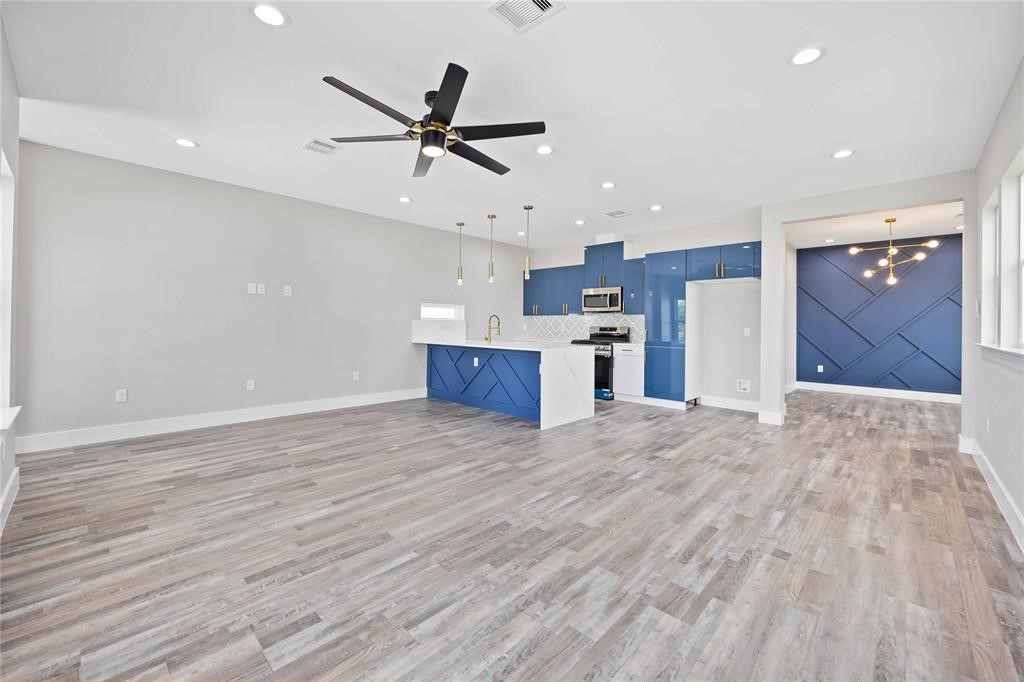 2118 Dan Street Houston, TX 77020 - Photo 29 of 35 a view of a kitchen with a dishwasher and a refrigerator