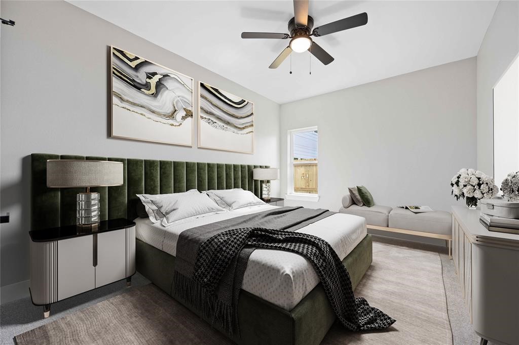 2118 Dan Street Houston, TX 77020 - Photo 33 of 35 a bedroom with a bed and lamp