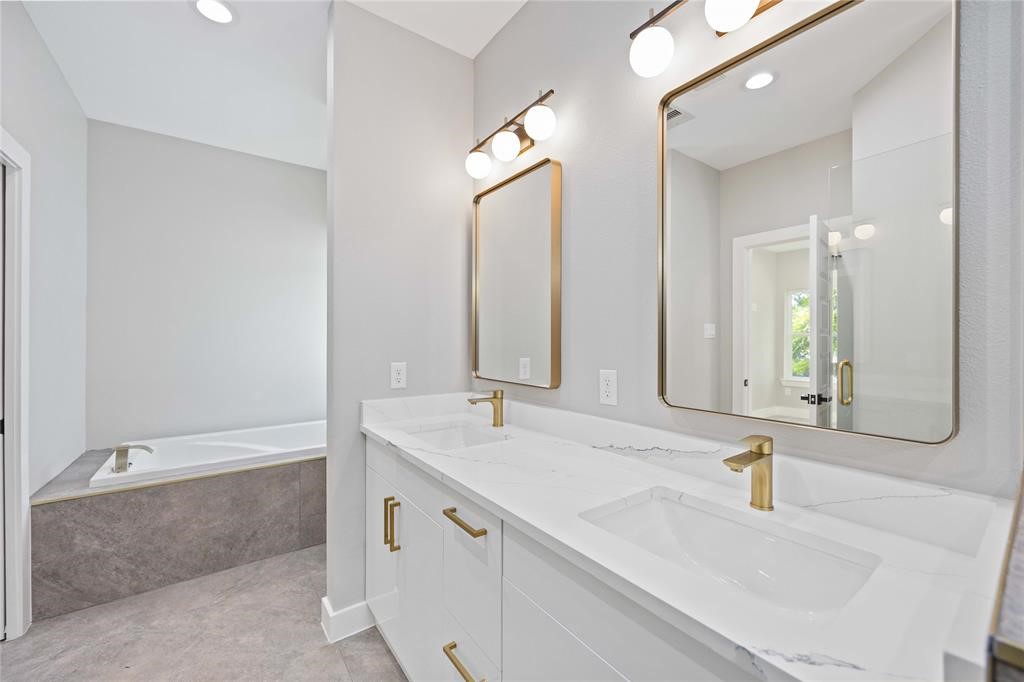 2118 Dan Street Houston, TX 77020 - Photo 6 of 35 a bathroom with a sink and a mirror