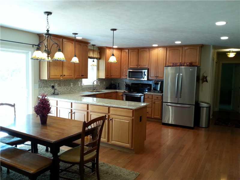 264 Steiner Bridge Road Valencia, PA 16059 - Photo 2 of 25 Kitchen. Everything sparkles in this recently updated kitchen. Granite countertops, glass backsplash and bronze hardware complete the contemporary d?cor.