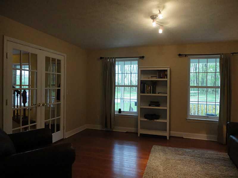 264 Steiner Bridge Road Valencia, PA 16059 - Photo 6 of 25 Living Room. Lots of windows fill the whole house with light.