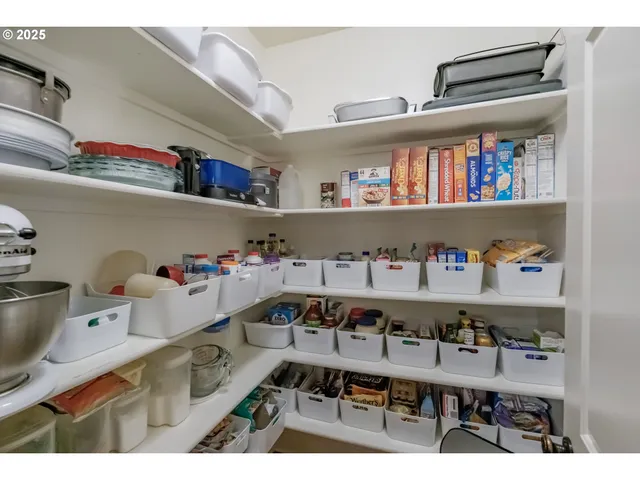 a bathroom with a sink mirror and toilet