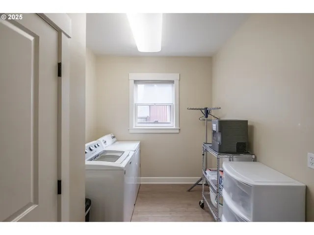 a bedroom with furniture window and fireplace
