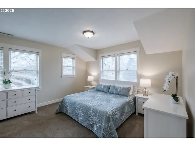 a bathroom with a sink a mirror and a shower