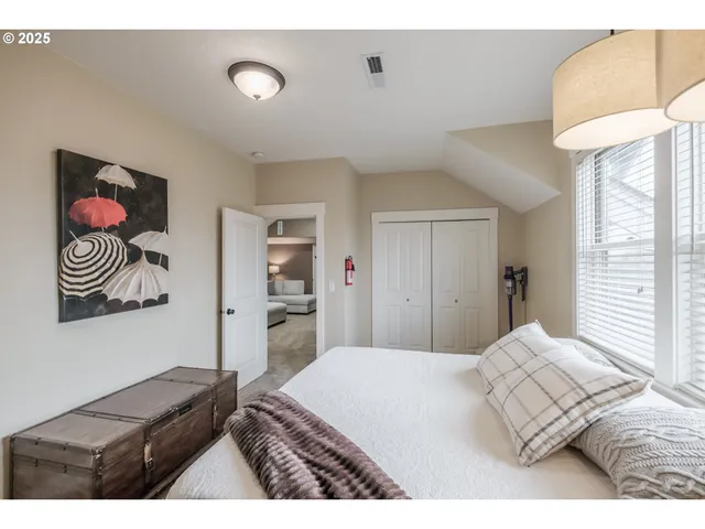 an aerial view of a house with a garden