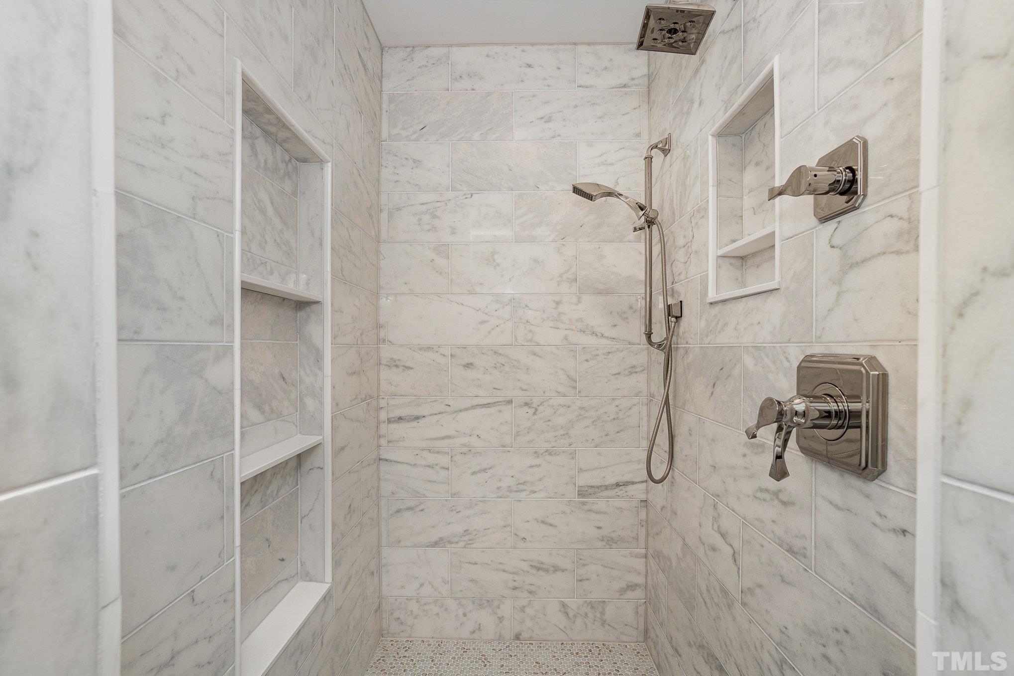 12036 Warwickshire Way Raleigh, NC 27613 - Photo 19 of 40 a bathroom with a shower