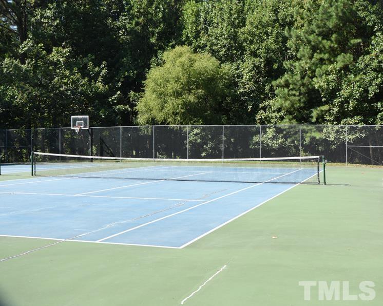 12036 Warwickshire Way Raleigh, NC 27613 - Photo 37 of 40 a view of a tennis court