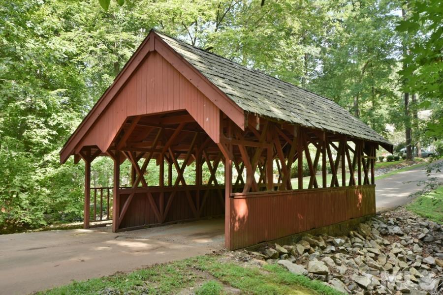 12036 Warwickshire Way Raleigh, NC 27613 - Photo 39 of 40 a view of a house with a yard