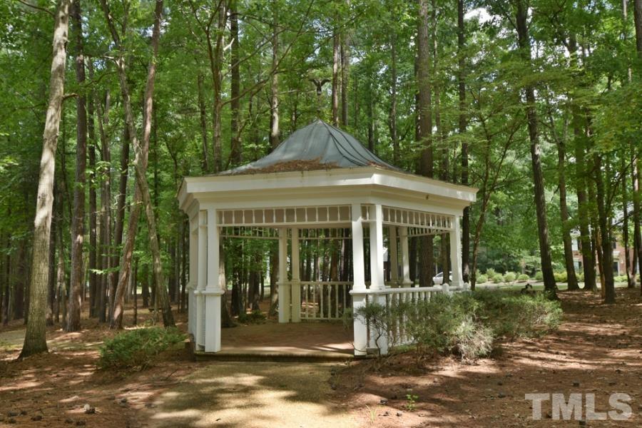 12036 Warwickshire Way Raleigh, NC 27613 - Photo 40 of 40 a front view of a house with a garden