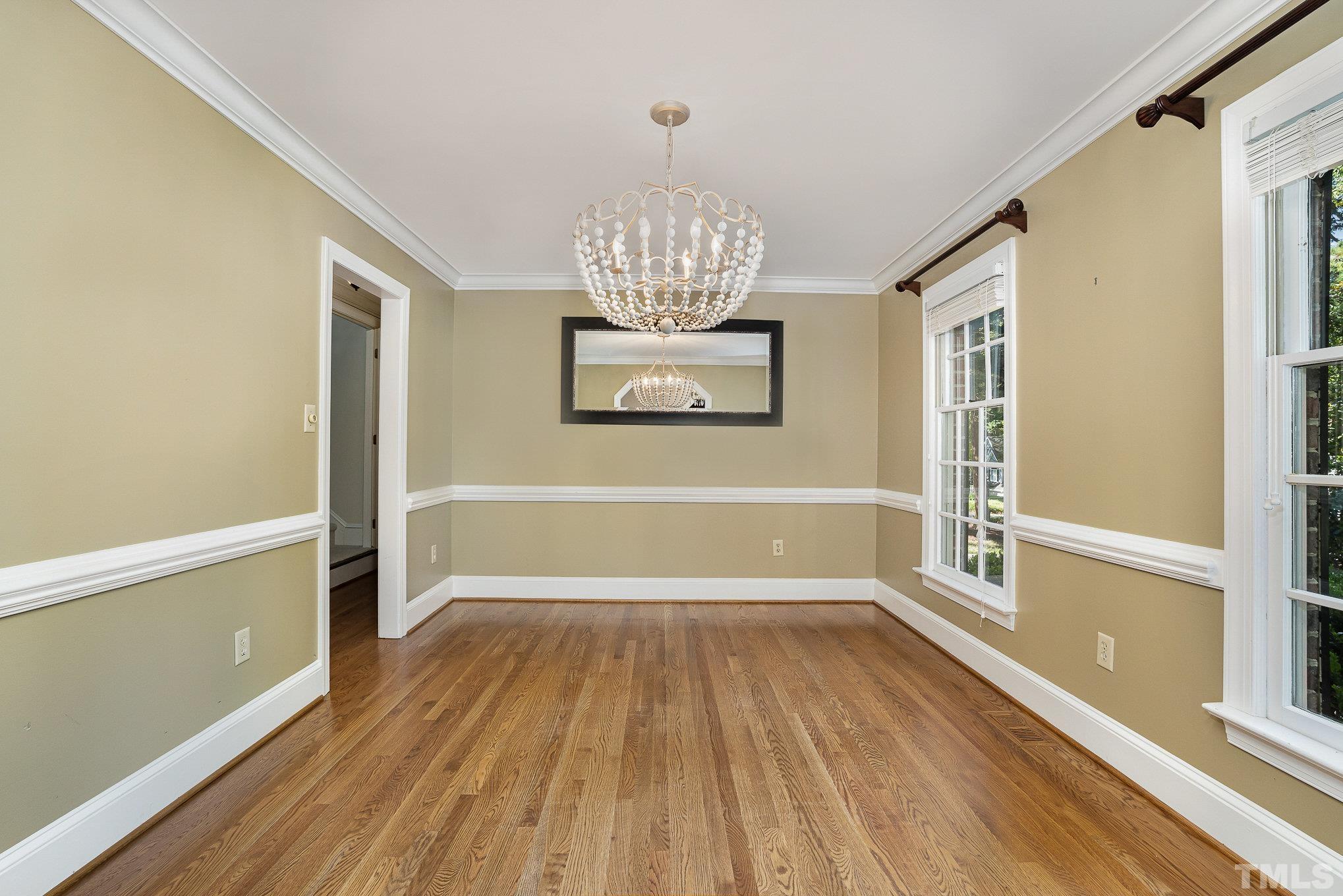12036 Warwickshire Way Raleigh, NC 27613 - Photo 9 of 40 a view of an empty room with a window