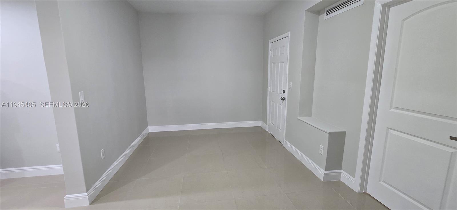 75 Southwest 32nd Court Road Miami, FL 33135 - Photo 11 of 53 a view of hallway with white walls