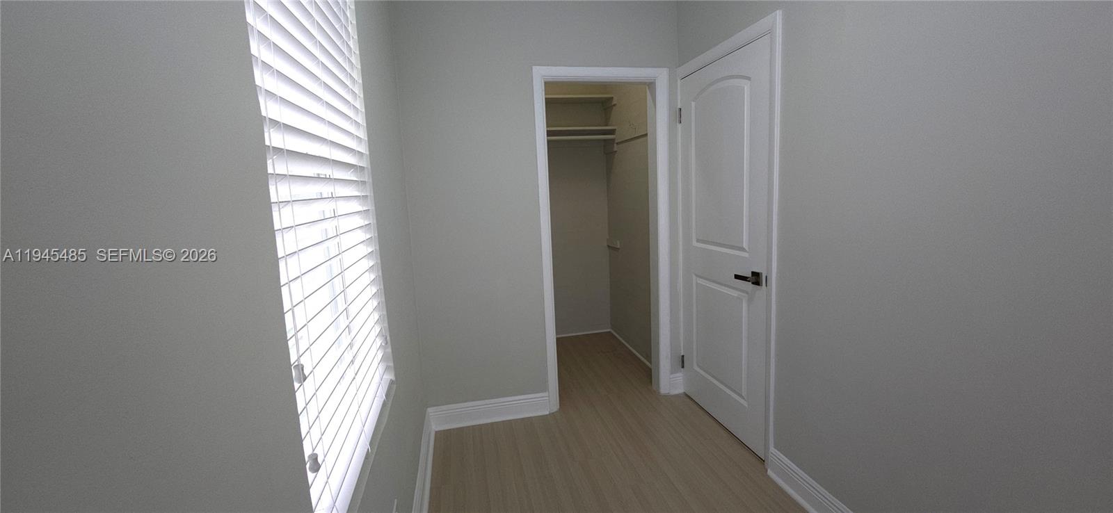 75 Southwest 32nd Court Road Miami, FL 33135 - Photo 24 of 53 a view of a hallway with windows