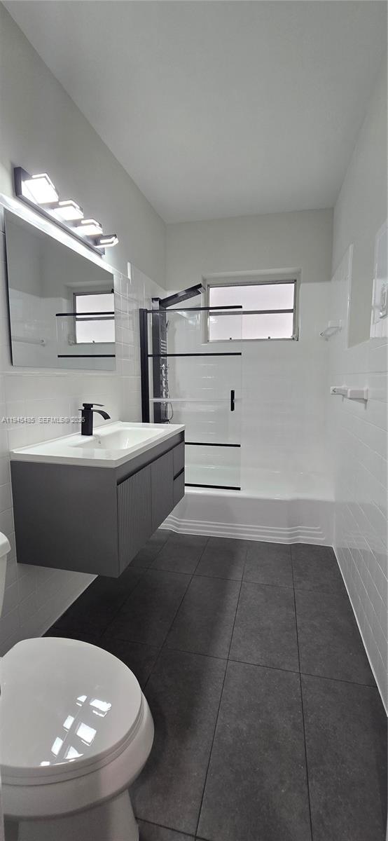 75 Southwest 32nd Court Road Miami, FL 33135 - Photo 25 of 53 a kitchen with a sink and cabinets