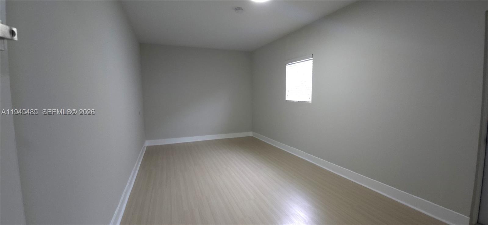 75 Southwest 32nd Court Road Miami, FL 33135 - Photo 36 of 53 a view of an empty room and window