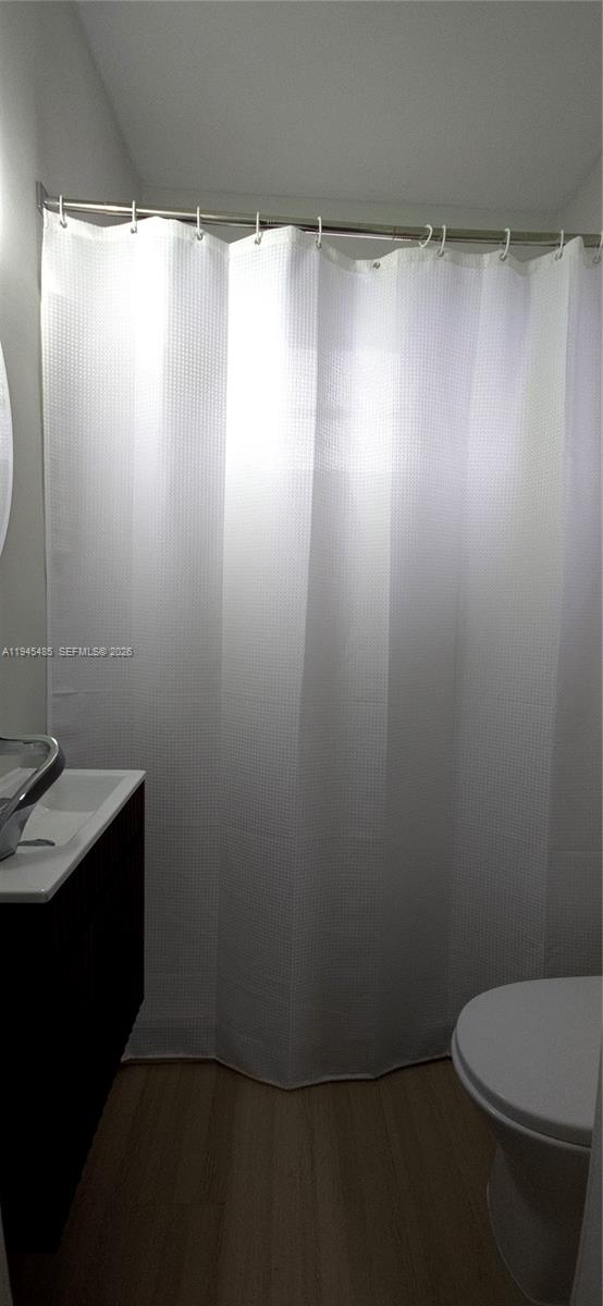 75 Southwest 32nd Court Road Miami, FL 33135 - Photo 40 of 53 a bathroom with a sink and a toilet