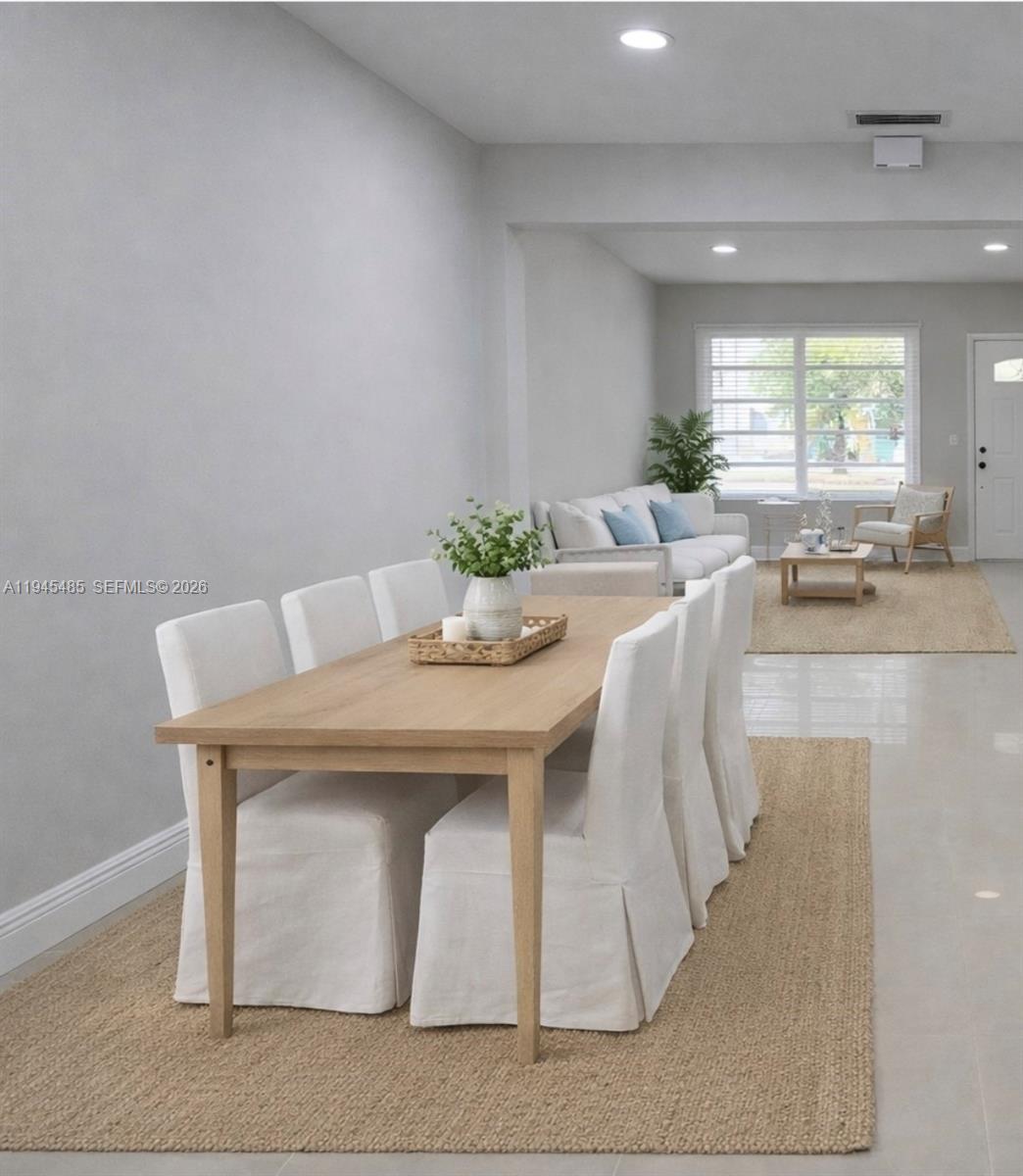 75 Southwest 32nd Court Road Miami, FL 33135 - Photo 4 of 53 a view of a dining room with furniture and window