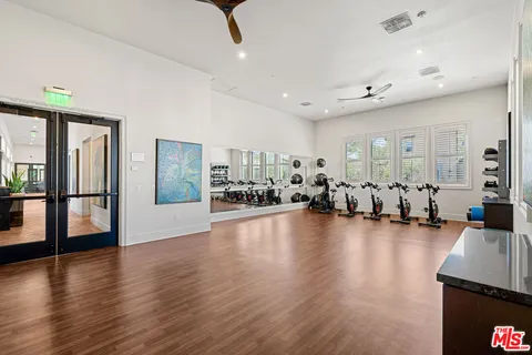 a view of a living room and livingroom with furniture wooden floor and windows