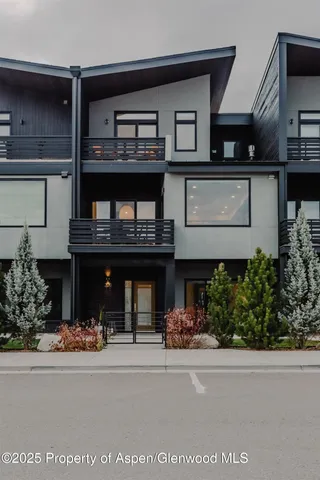 front view of a house with a street