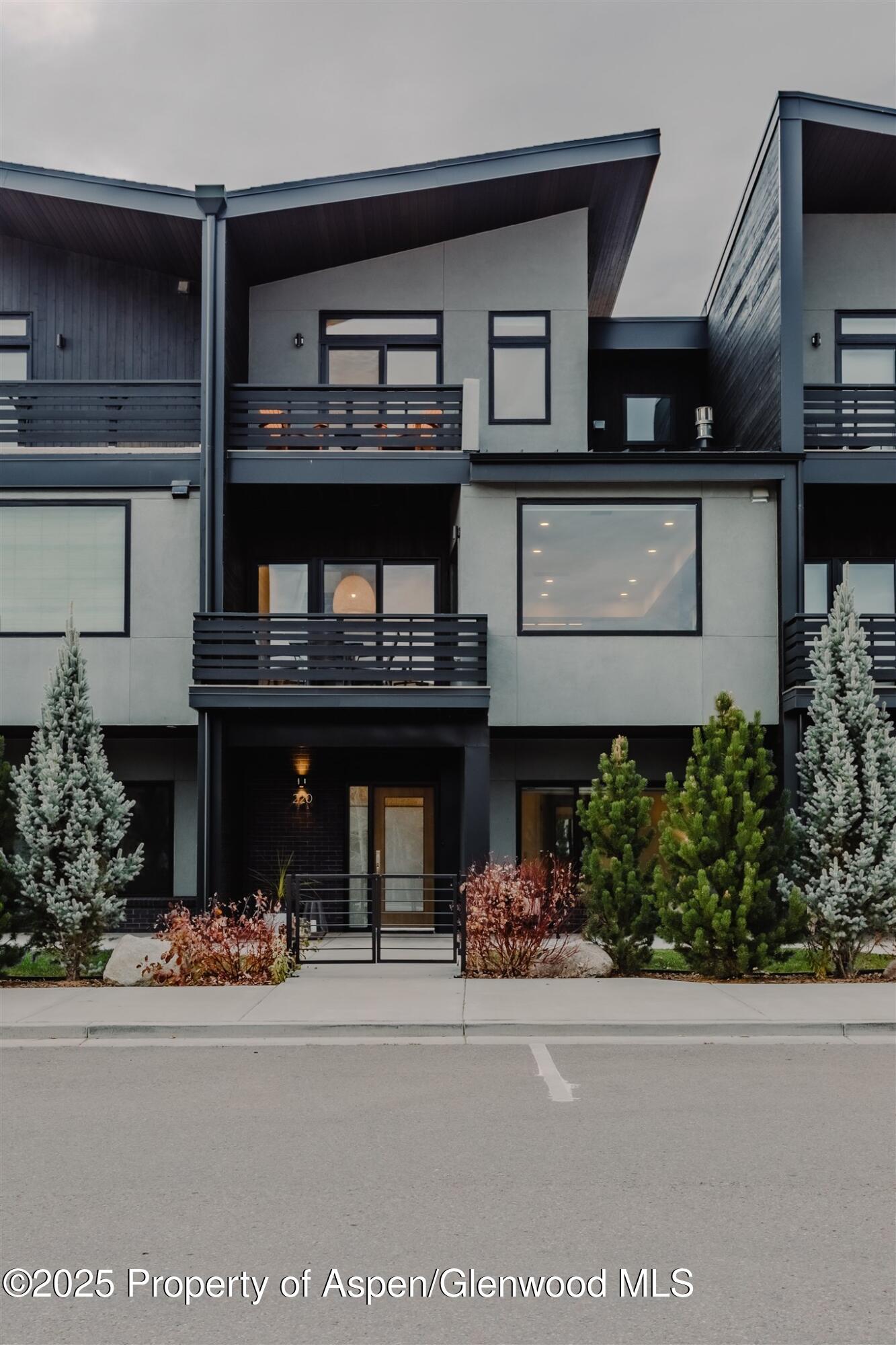 front view of a house with a street