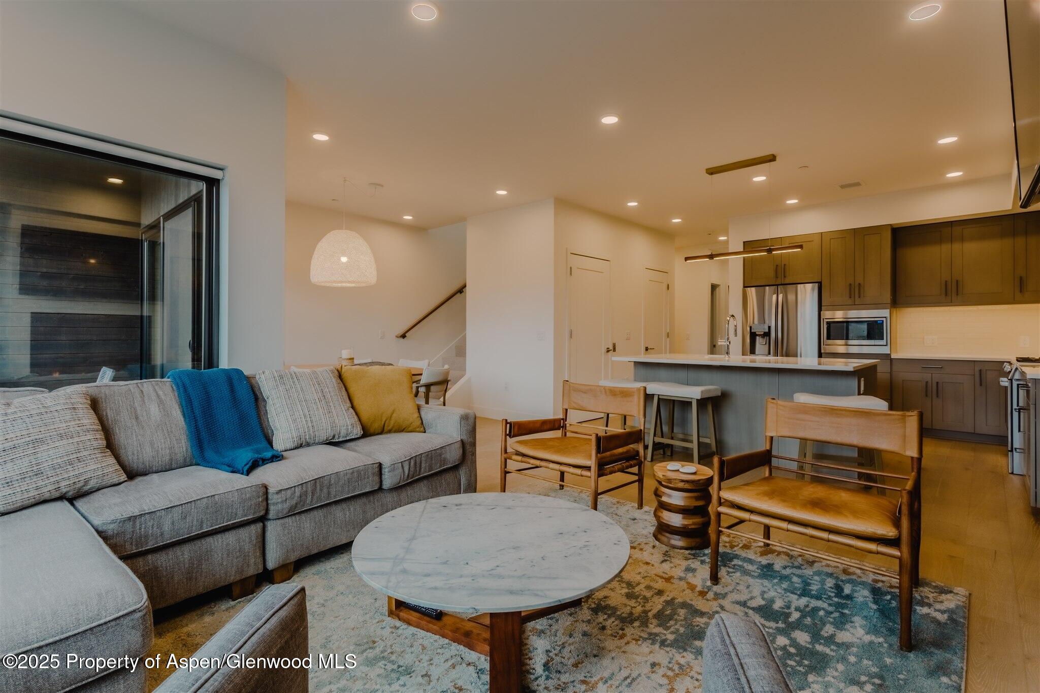 220 Lewis Lane Basalt, CO 81621 - Photo 16 of 62 a living room with furniture and kitchen view