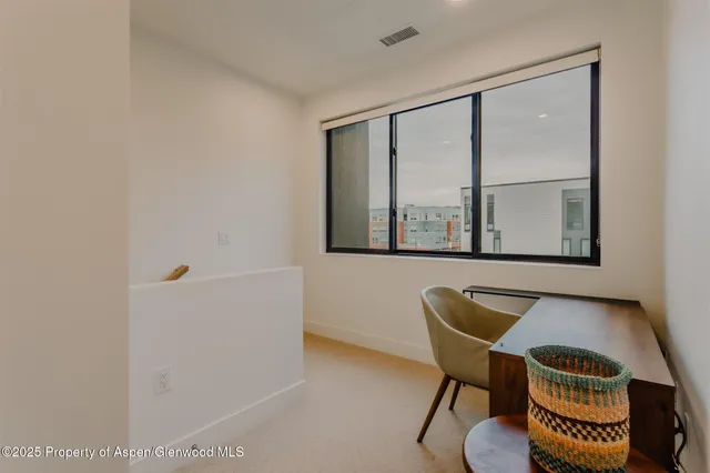 a view of an empty walk in closet