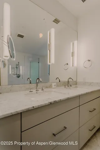 a view of an empty walk in closet