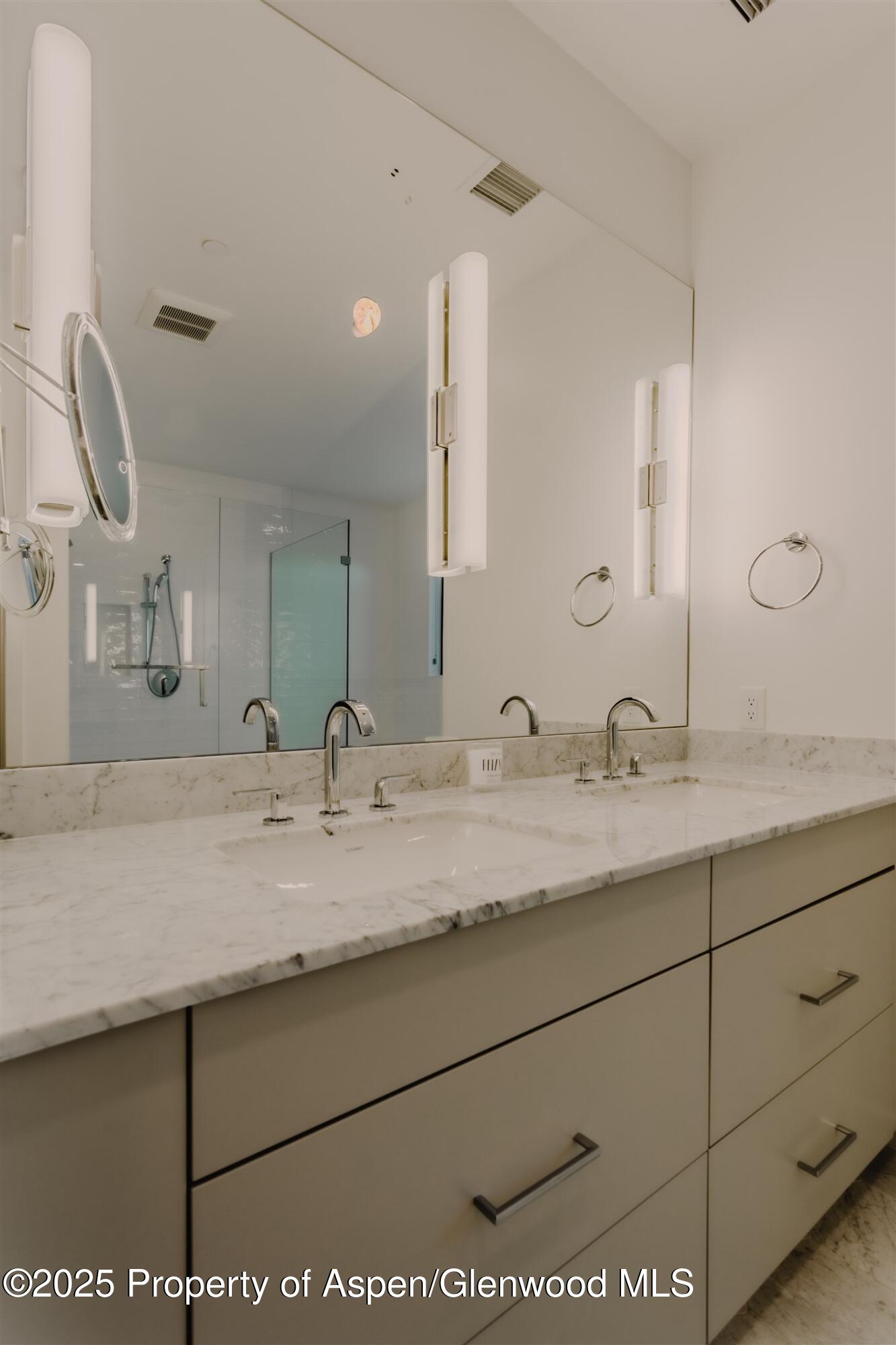 220 Lewis Lane Basalt, CO 81621 - Photo 31 of 62 a bathroom with a sink and a mirror