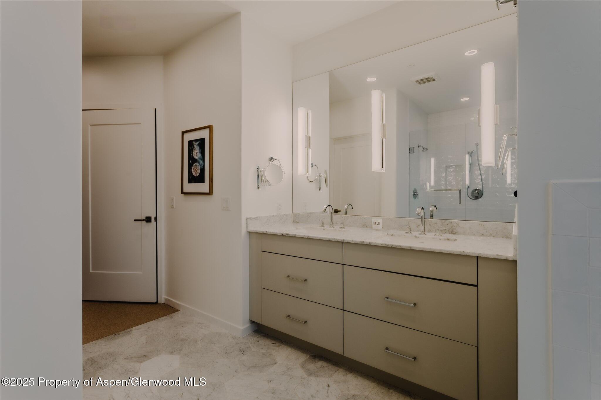220 Lewis Lane Basalt, CO 81621 - Photo 32 of 62 a bathroom with a granite countertop sink mirror and double
