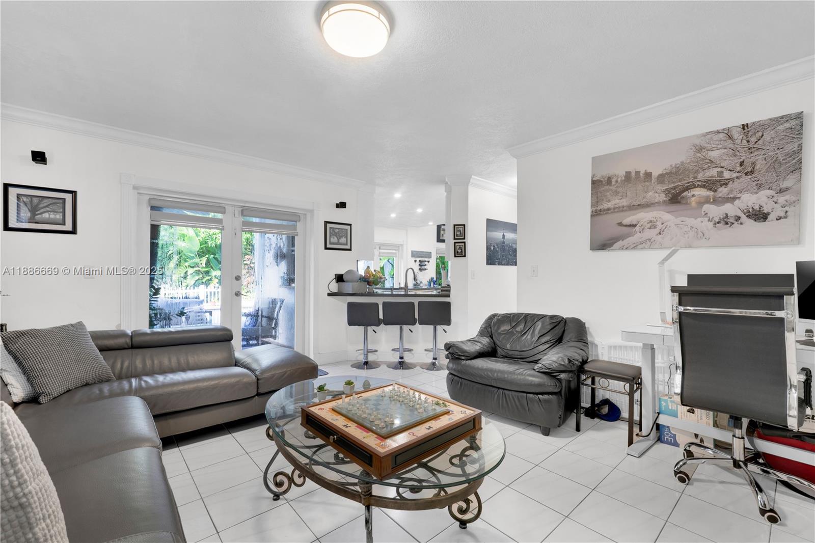 11126 Southwest 148th Place Miami, FL 33196 - Photo 15 of 33 a living room with furniture and a flat screen tv