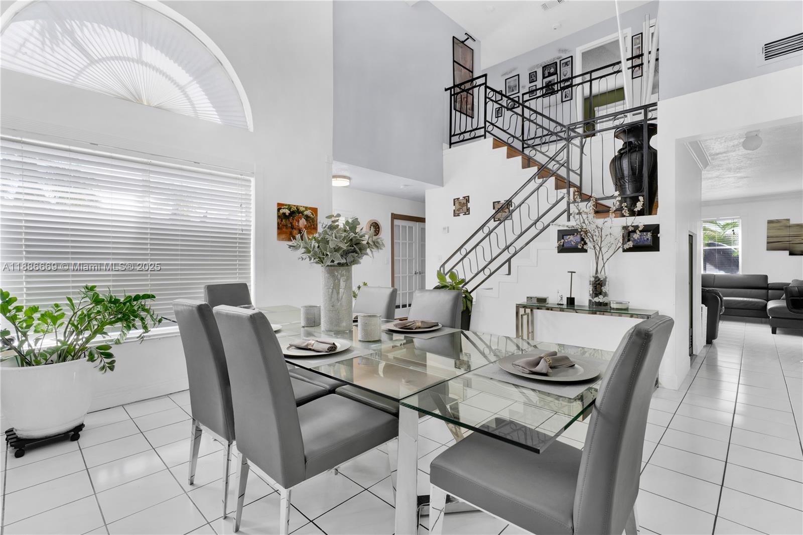 11126 Southwest 148th Place Miami, FL 33196 - Photo 5 of 33 a view of a livingroom and dining room