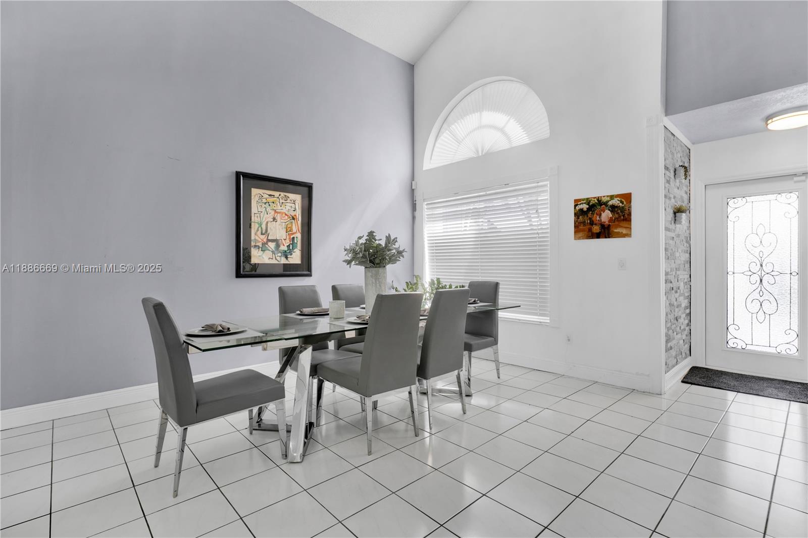 11126 Southwest 148th Place Miami, FL 33196 - Photo 6 of 33 a view of a dining room with furniture