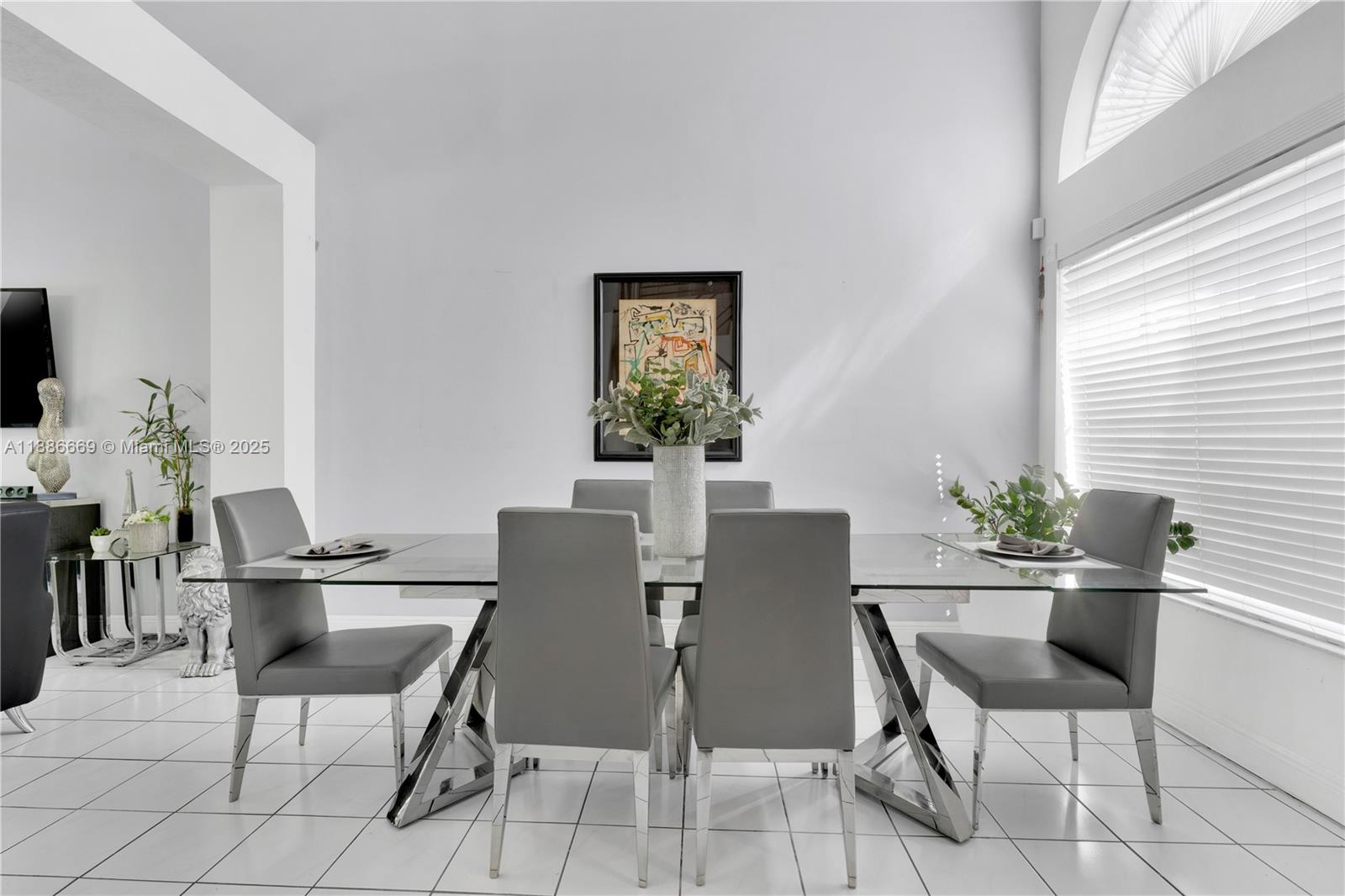 11126 Southwest 148th Place Miami, FL 33196 - Photo 7 of 33 a view of a dining room with furniture