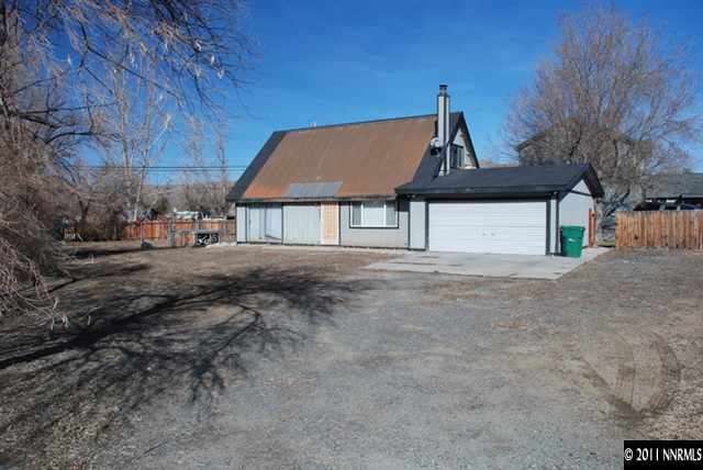 3605 Brant Street Reno, NV 89508 - Photo 1 of 1 a front view of a house with a yard