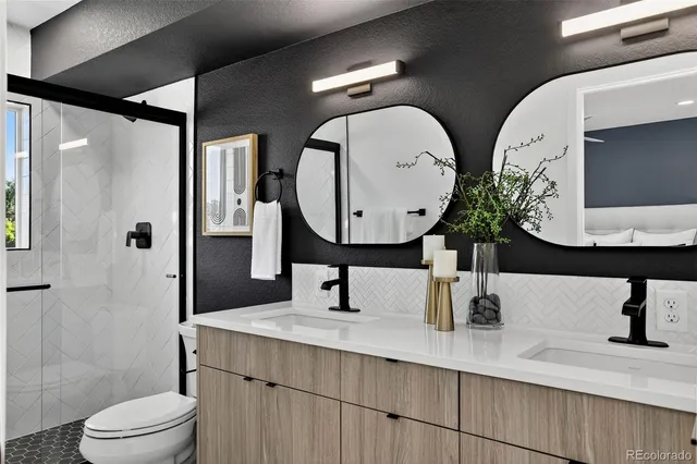 a bedroom with a bed and a night stand