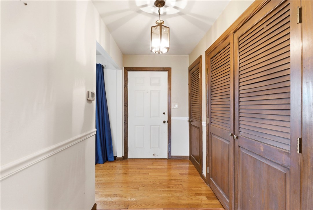 6711 Hamilton-Middletown Road Franklin, OH 45005 - Photo 5 of 49 This inviting entryway features warm hardwood floors and classic wood doors.