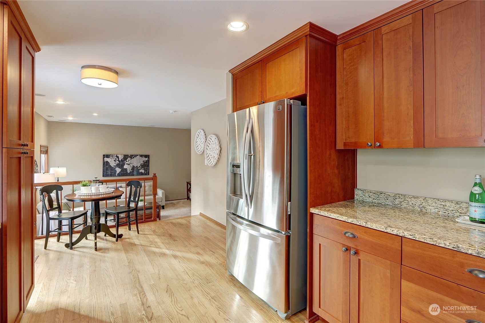 2332 238th Place Southeast Bothell, WA 98021 - Photo 12 of 32 a kitchen with stainless steel appliances granite countertop a refrigerator and a stove top oven