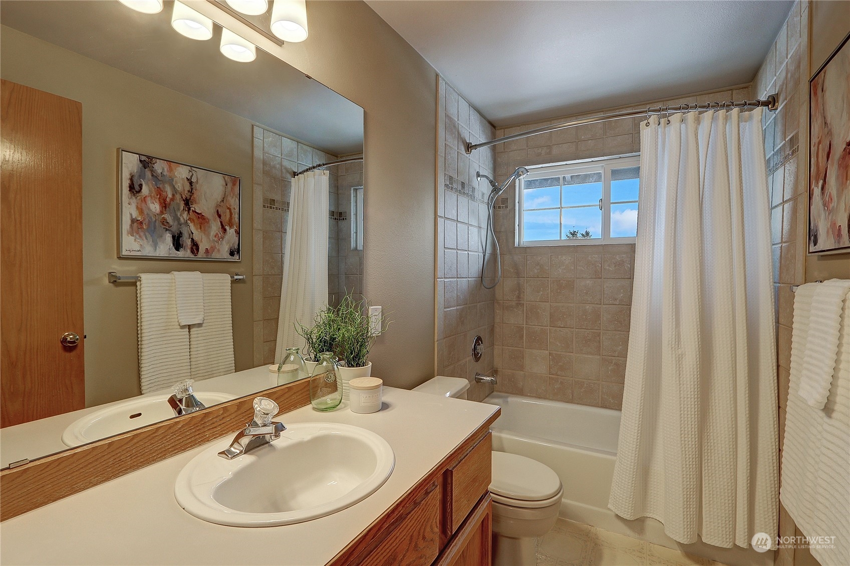 2332 238th Place Southeast Bothell, WA 98021 - Photo 22 of 32 a bathroom with a sink and a mirror