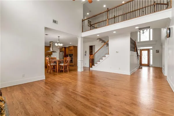 a view of a livingroom with furniture and a gallery