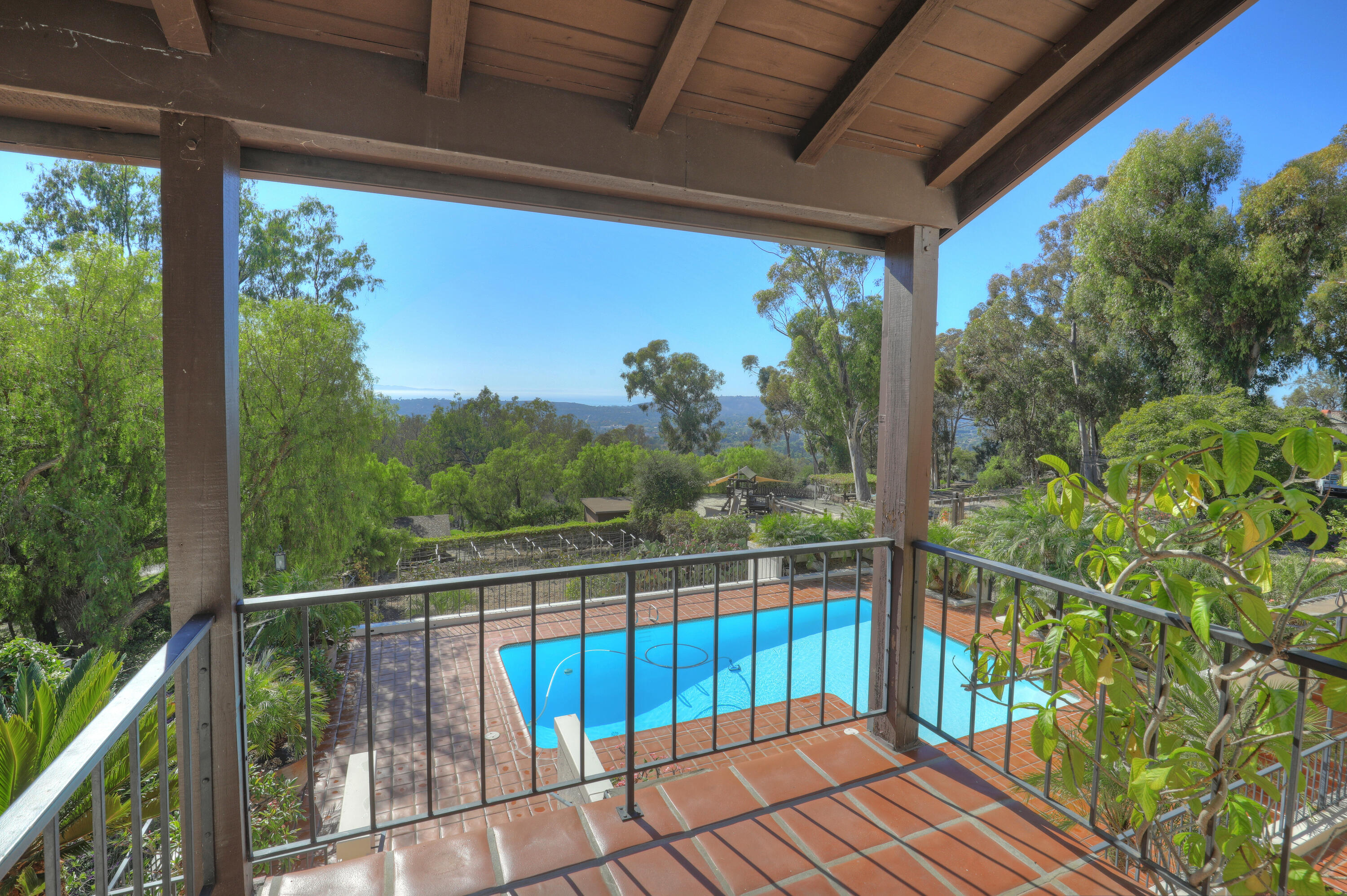 2360 Foothill Road Santa Barbara, CA 93105 - Photo 15 of 24 a view of a balcony with green trees