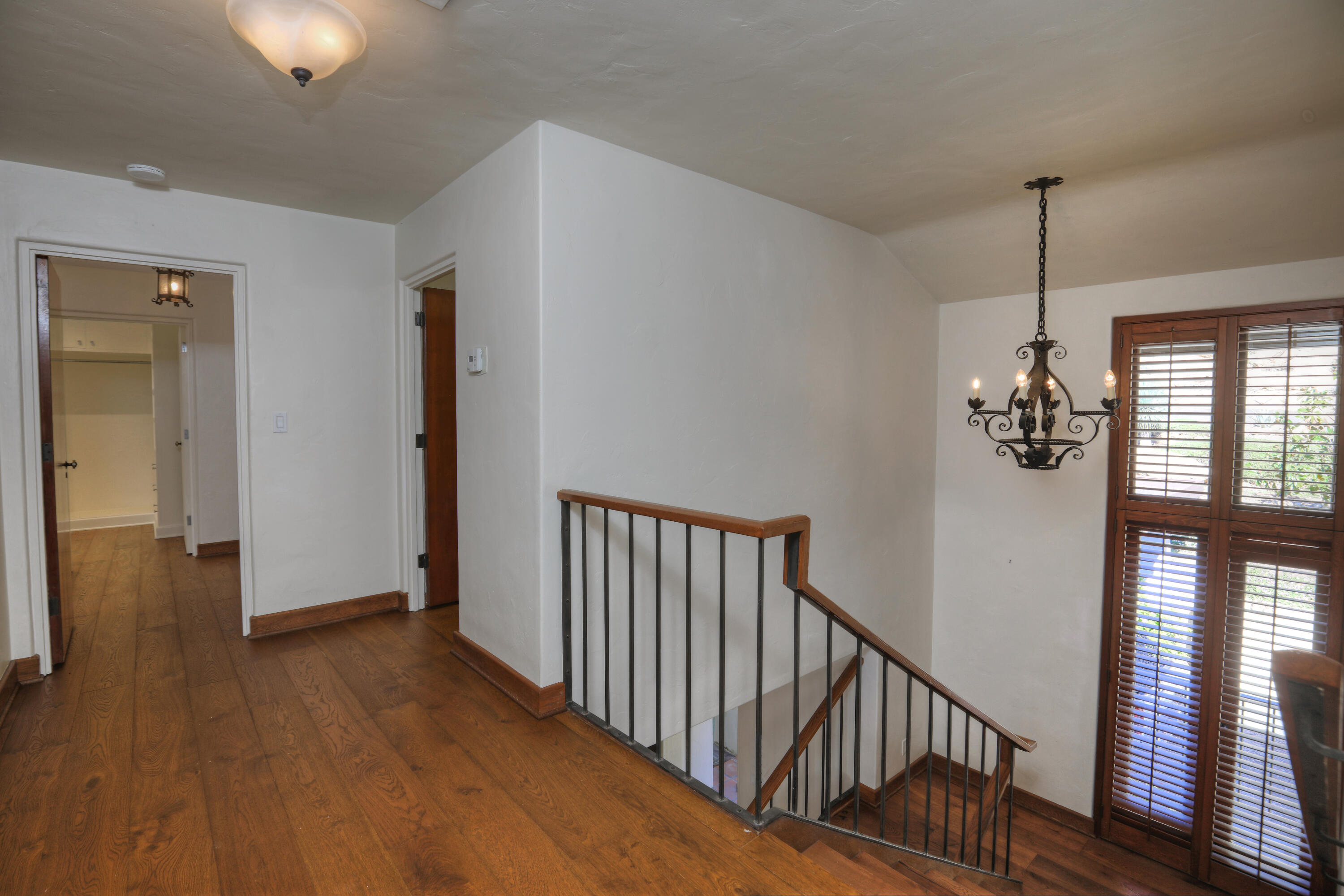 2360 Foothill Road Santa Barbara, CA 93105 - Photo 8 of 24 a view of a hallway with wooden floor and stairs