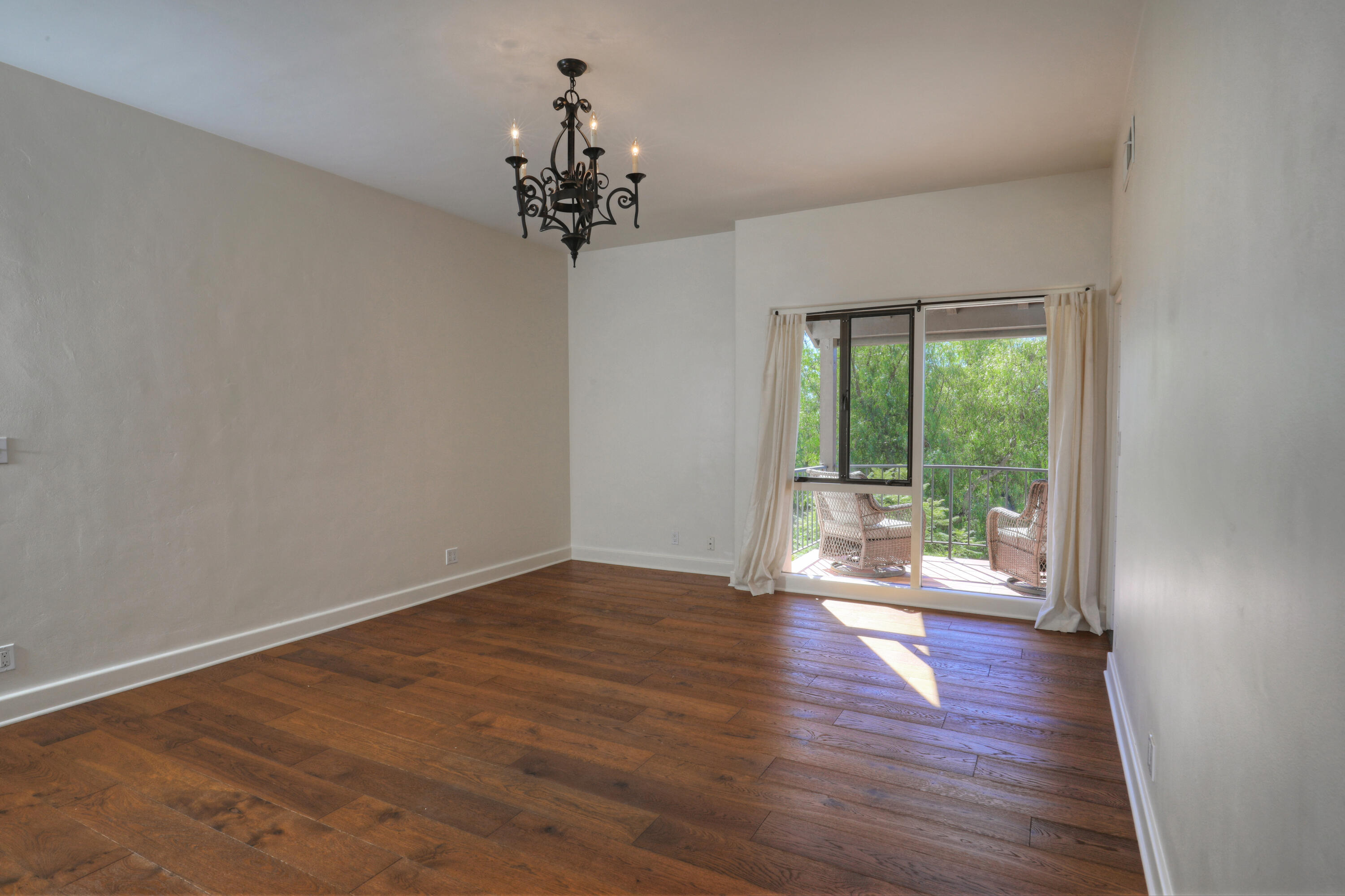 2360 Foothill Road Santa Barbara, CA 93105 - Photo 10 of 24 wooden floor in an empty room with a window